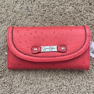 Jessica Simpson coral wallet with checkbook cover.